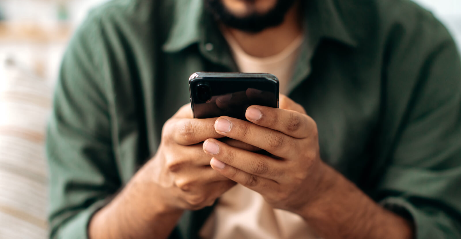 Close-up of a person holding a smartphone