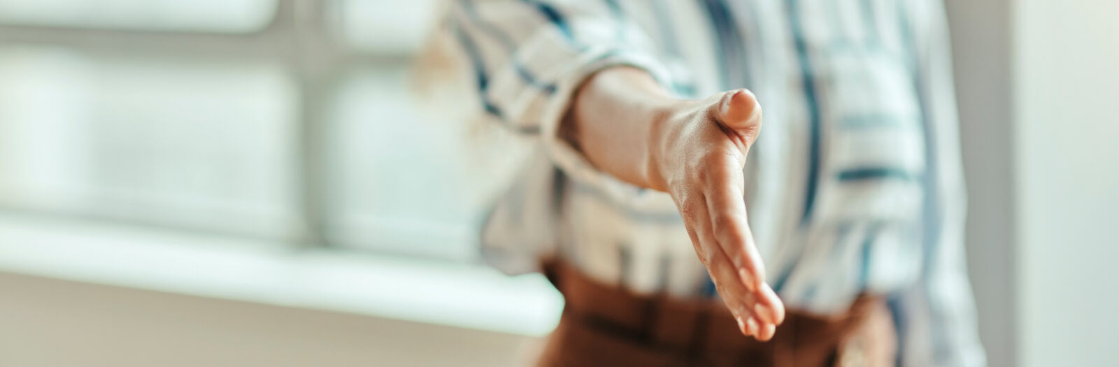 Office person with open handshake