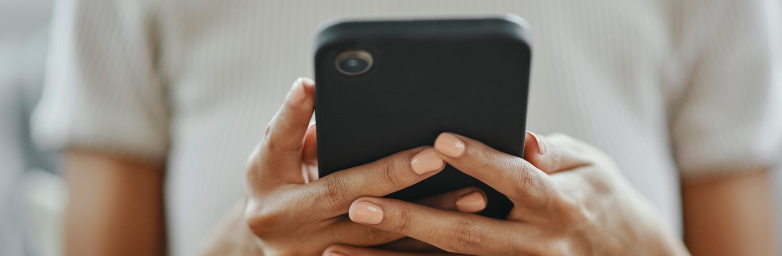 Close-up of person holding mobile phone